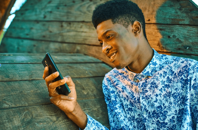 Group of professionals discussing the impact and effectiveness of text messaging for nonprofit engagement strategies