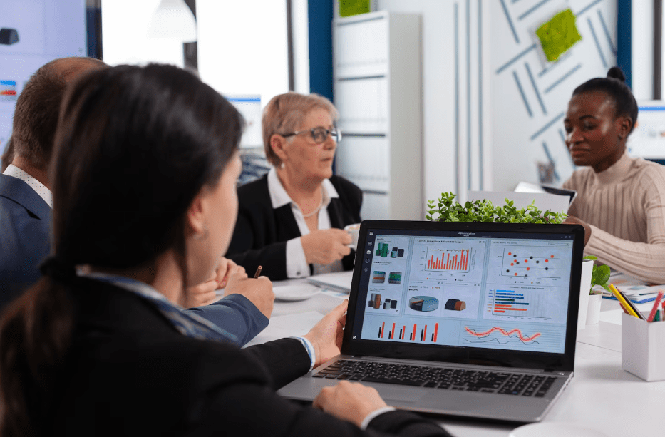 A team discusses data surfaced by enterprise search